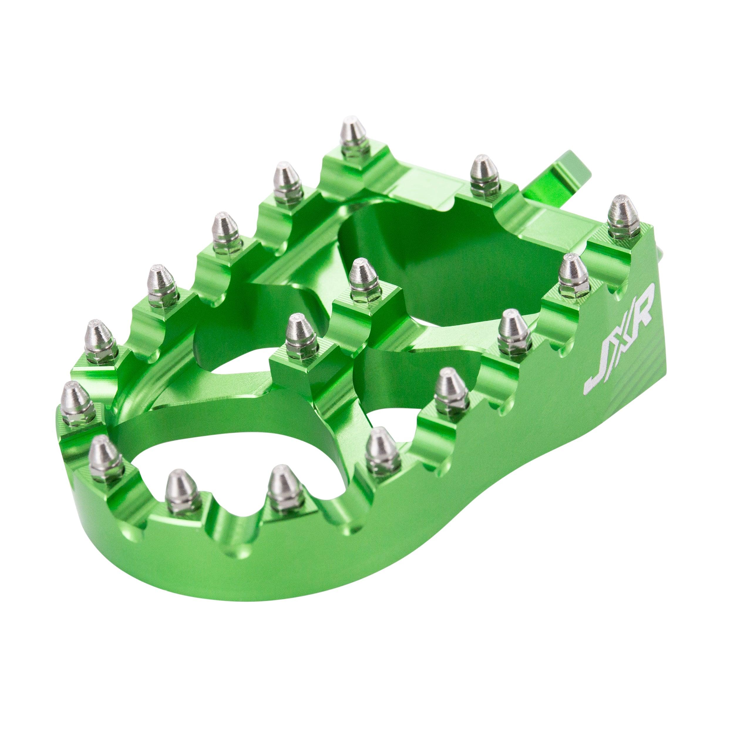 JXR footpegs Talaria Sting close-up showing aggressive teeth design green