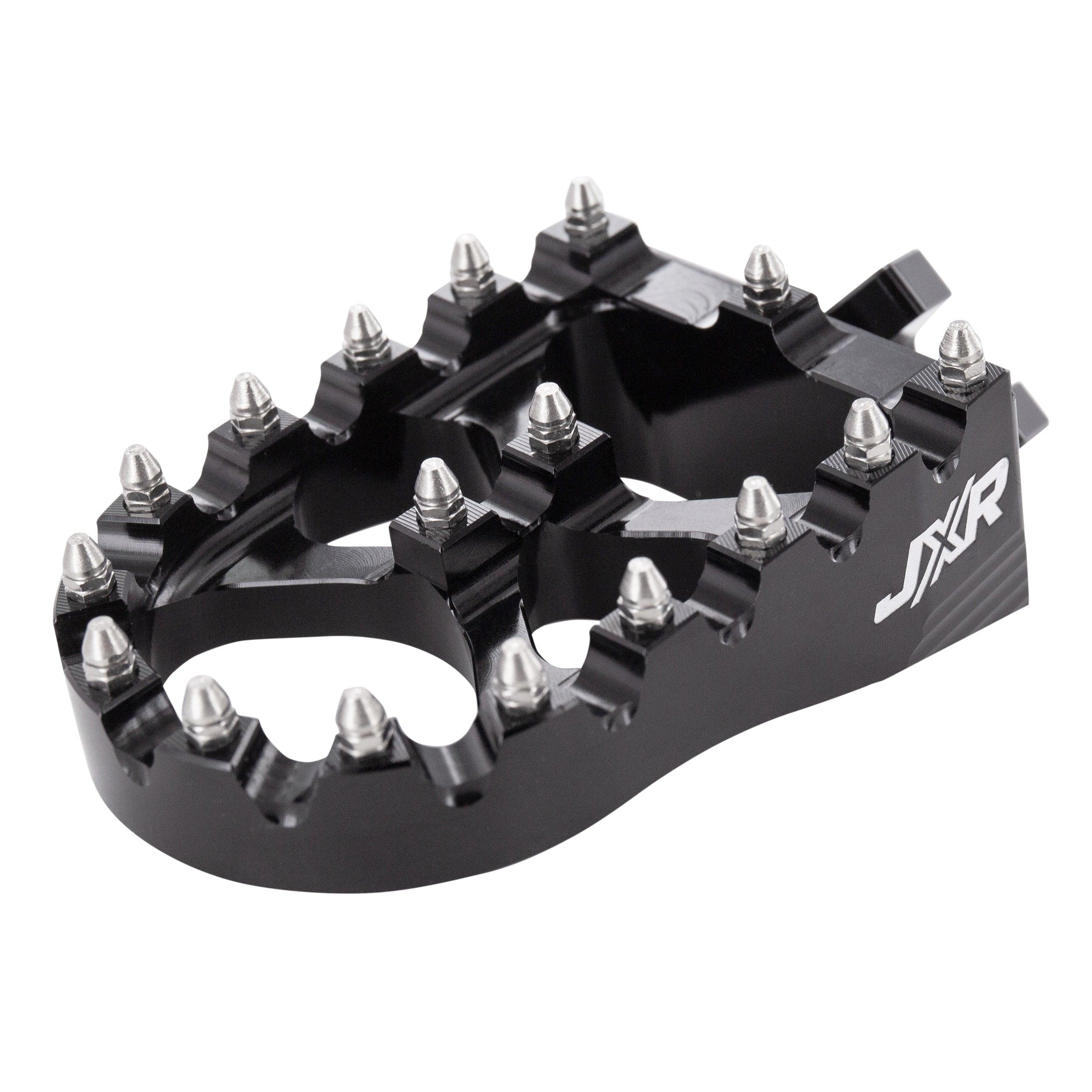JXR footpegs Talaria Sting close-up showing aggressive teeth design black